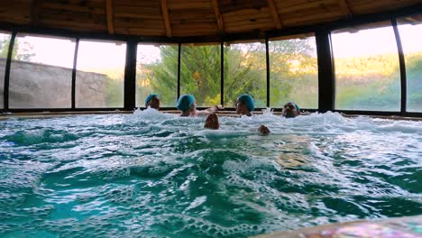 Cazorla,-Spain,-July-14,-2024:-Young-couples-relaxing-in-Spa-enjoy-the-water-bubbles