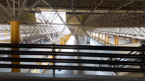 woman-backpack-walking-train-station-Tehran-arrive-trip-travel-adventure-journey-explore-city-sightseeing-tourist-destination-arrival-travel-photography-culture-urban-exploration-train-travel-iran