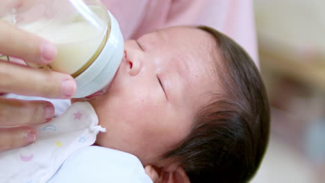 Detail-of-mother-breastfeeding-her-newborn-child