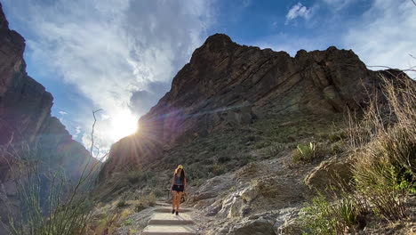 Young-Woman-on-Hiking-Trail-in-Big-Bend-National-Park,-Texas-USA,-Arriving-on-Santa-Elena-Canyon