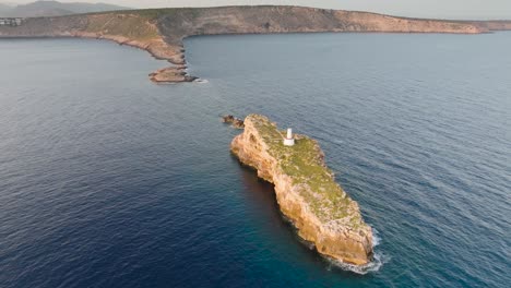 Bright-evening-aerial-view-of-Punta-de-El-Toro-rock-path-in-sea,-Mallorca