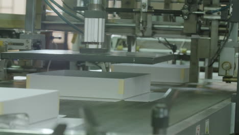 Real-shot-of-conveyor-belt-in-printing-factory-Automated-copier-manufacturing-process-in-a-paper-manufacturing-plant