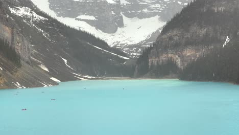 Beautiful-Summer-Snowfall-On-Lake-Louise-In-Banff