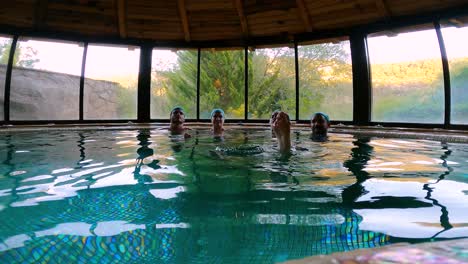 Cazorla,-Spain,-July-14,-2024:-Young-couples-relaxing-in-Spa-enjoy-the-water-bubbles