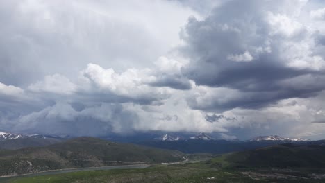 Aerial-view-of-clouds-over-a-mountain-landscape-in-Colorado