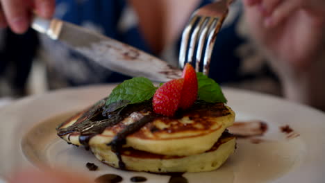 Delicious-pancakes,-chocolate-sauce,-strawberries,-luxury-hotel-food