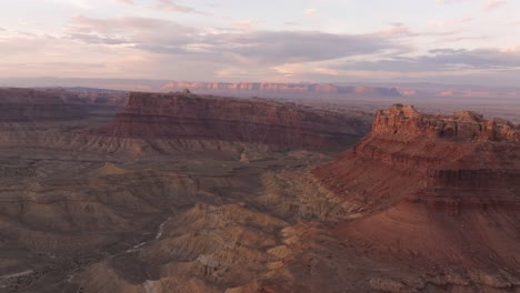 Ascending-aerial-view-of-plateaus-in-a-mesa-desert-landscape