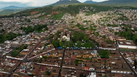 HIGH-ALTITUDE-ORBIT-OF-PATZCUARO-MICHOACAN-MAIN-CHURCH-AT-SUNSET