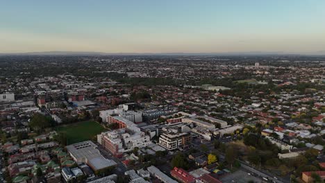 Panoramic-aerial-view-over-the-Brunswick-area-of-Melbourne,-Australia-during-sunset