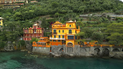 Portofino,-a-picturesque-coastal-town-in-Liguria,-Italy,-features-the-iconic-Castello-Brown-and-Villa-Olivetta