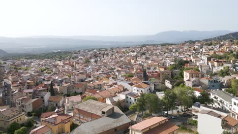 Aerial-Cityscape-Shot-Of-Homes-And-Streets-In-Dorgali,-Sardina