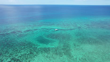 small-speed-boat-parked-at-reef
