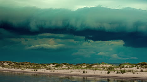 Storm-clouds-gather-over-a-beach-in-a-dramatic-cloudscape-time-lapse