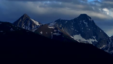 Capital-Peak-Maroon-Bells-Mt-Sopris-Sopras-old-mount-Snowmass-Resort-Colorado-aerial-drone-dark-clouds-sunset-Aspen-Wilderness-summer-June-July-Rocky-Mountains-peaks-National-Forest-static-shot