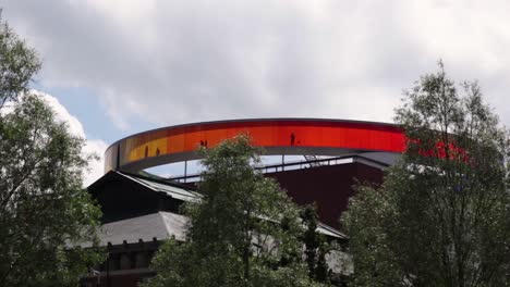 The-colorfull-walkway-on-top-of-the-art-museum-"aros"-in-Aarhus,-Denmark-during-a-sunny-summer-day