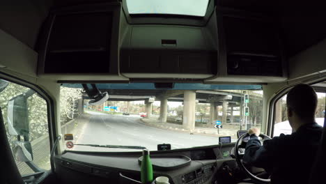 In-cab-view-of-a-HGV-driver-honking-his-horn-at-a-van-that-cut-him-up-on-the-M6-spaghetti-junction-roundabout