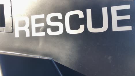 Police-Swat-vehicle-on-display-with-slow-pan-reveal-of-word-"Rescue