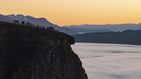 Time-lapse-of-sight-point-over-city-Tromso-covered-with-fog,-Norway