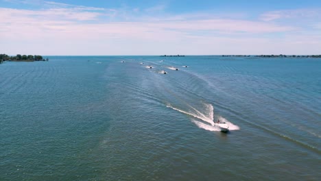 Boats-cruising-across-open-water-on-sunny-summer-day