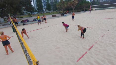 Beach-Volleyball-competition,-Broadbeach,-Gold-Coast,-Australia,-golden-hour