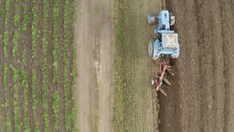 Aerial-Footage-of-Agricultural-Field-And-Tractor-in-Slovakia---Aerial-Shot