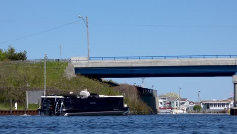 Pontoon-on-AuSable-River-in-Oscoda,-MI