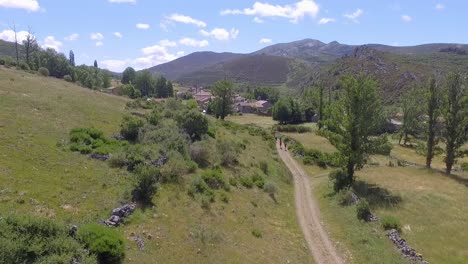 People-running-in-group-in-the-nature-aerial-shot