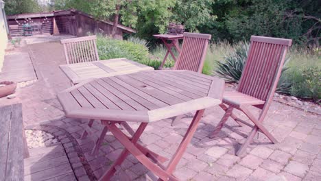 Garden-furniture-on-terrace-in-beautiful-garden