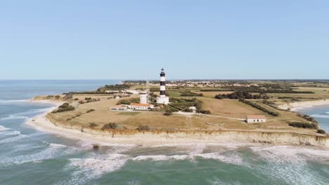 Aerial-view-of-Lighthouse-of-Chassiron-moving-in