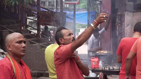 Slow-Motion-Of-A-Hindu-Praying-inside-a-Temple-in-Rishikesh-India-Neelkanth-Mahadev-Temple