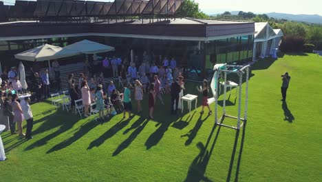 Aerial-view-of-the-ceremony-on-the-wedding-day-of-two-newlyweds