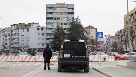 An-Italian-police-officer-and-car-on-the-bridge-in-Mitrovica