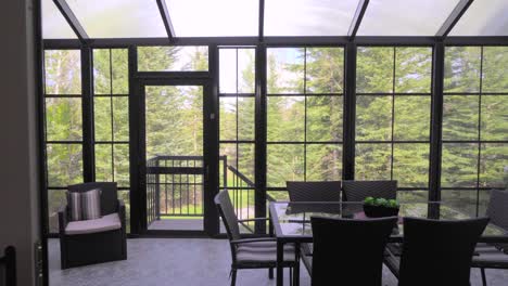 a-beautiful-sunroom-with-an-indoor-barbeque-are,-and-a-tile-feature-wall