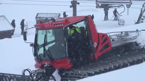 Pistenbully-operator-entering-the-cab