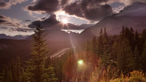 Highway-trough-mountains-and-sun-bursting