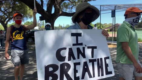 Hundreds-of-people-carrying-signs-in-peaceful-protest-of-police-brutality-in-wake-of-death-of-George-Floyd-killed-by-Minneapolis-police-office-last-week