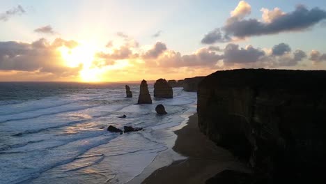 Waves-rushing-on-the-Great-Ocean-Road-shore-in-Australia-at-sunset