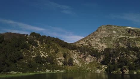 Viewpoint-of-Monturull-mountain-from-a-lake,-in-La-Cerdanya