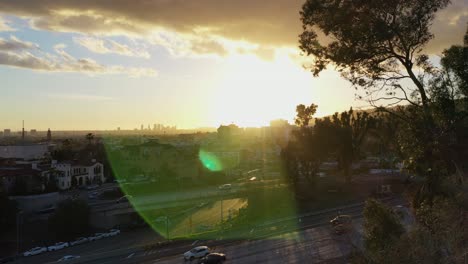 Cars-on-freeway-with-lens-flare---Los-Angeles,-California