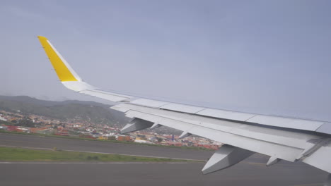 Airplane-wing-going-up-in-Tenerife