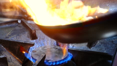 Fry-bacon-in-a-pan-with-fire