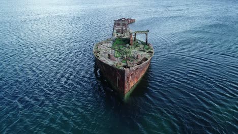 Aerial-footage-of-the-Wreck-of-Juniata,-an-old-abandoned-ship-at-Inganess-Bay-on-the-mainland-of-Orkney