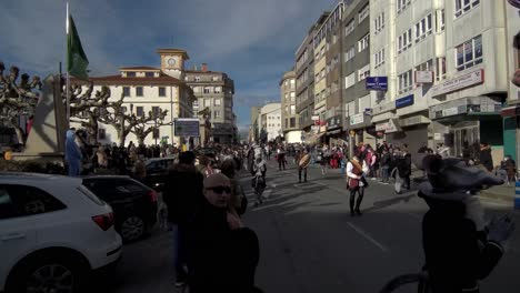 Performers-Parading-Through-Street-During-Carnival-In-Ordes-To-Theme-Of-The-Falutist-of-Hemelin-In-Ordes,-Spain