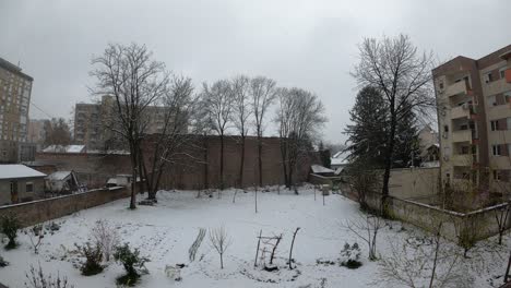 Snow-is-falling-in-the-courtyard-of-the-building-Time-lapse-OSIJEK-,-CROATIA