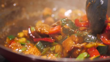 Delicious-Asian-stir-fry-cuisine-sizzling-in-a-pan