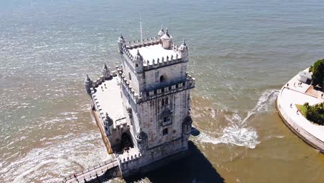 Belém-Tower,-the-Tower-of-Saint-Vincent-in-sea,-Lisbon-Portugal,-aerial-view