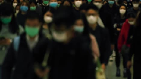 Hong-Kong,-China---March-10,-2020:-Slow-motion-of-people-wearing-medical-face-masks-at-metro