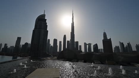 4K:-The-world's-tallest-building,-Burj-Khalifa,-against-the-sunlight-on-a-hot-summer-day-in-the-UAE