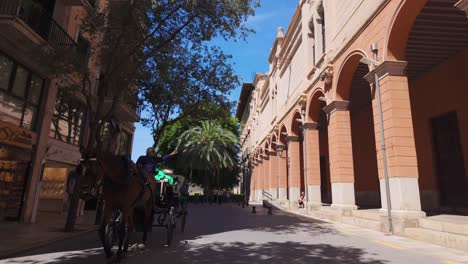 Horse-carriage-eco-transport-in-Palma-de-Mallorca-streets,-Spain-old-town