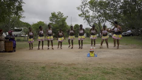 A-group-of-children-performs-a-traditional-dance-outdoors-in-South-Africa